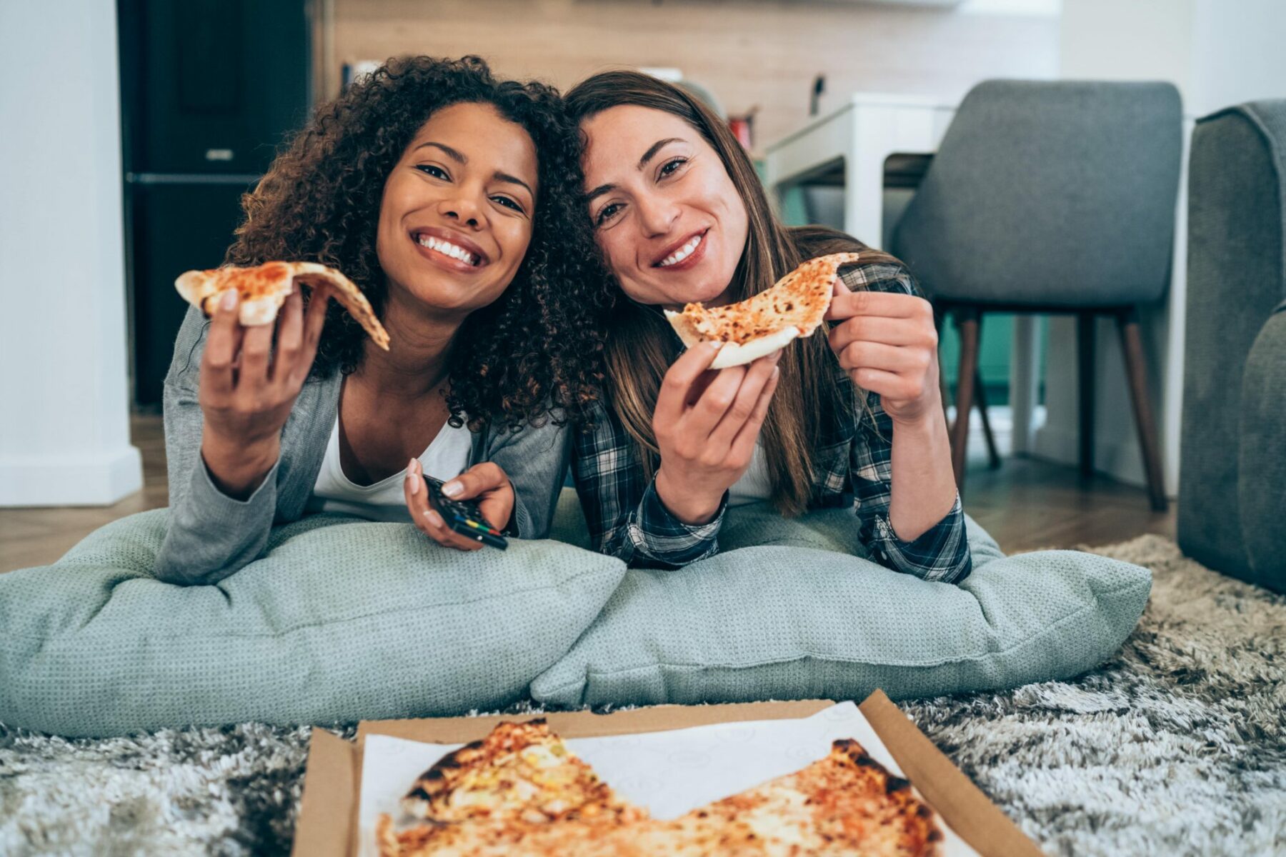 Women Eating Pizza